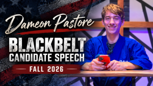 Graphic thumbnail for Dameon Pastore's Fall 2026 Blackbelt Candidate Speech, featuring Dameon smiling at a wooden table in a blue martial arts uniform holding a phone against an American flag background.